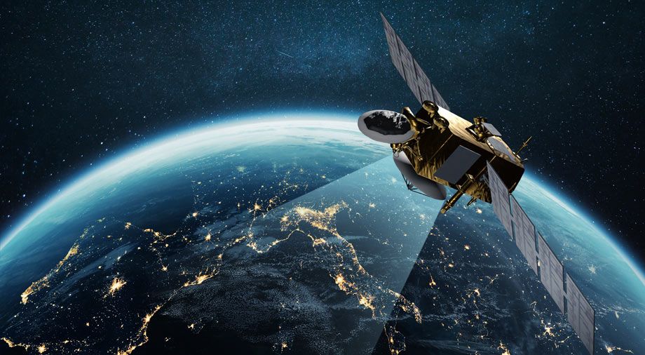 Earth observation satellite above the night side of Earth